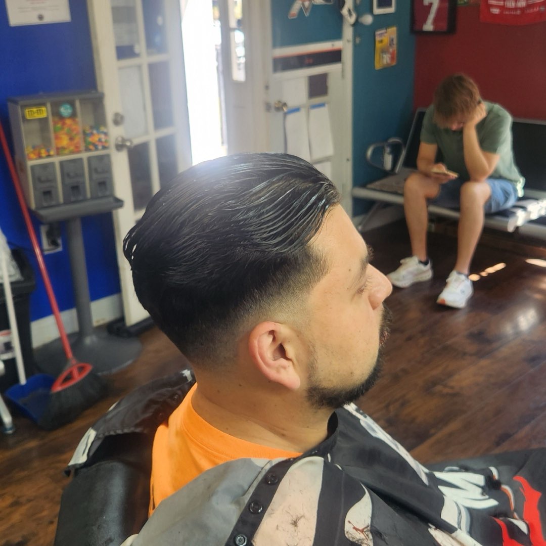 Slicked-back fade haircut at Sees Barbershop, Concord, CA