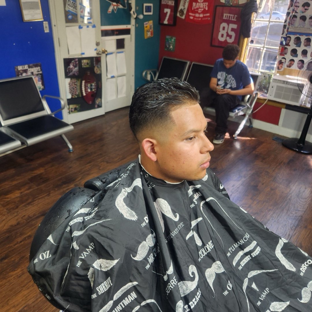 Men's clean fade with a sleek top at Sees Barbershop, Concord, CA